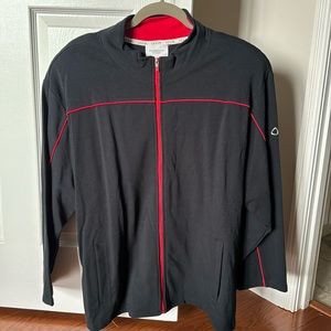 Black sweater with red stripe